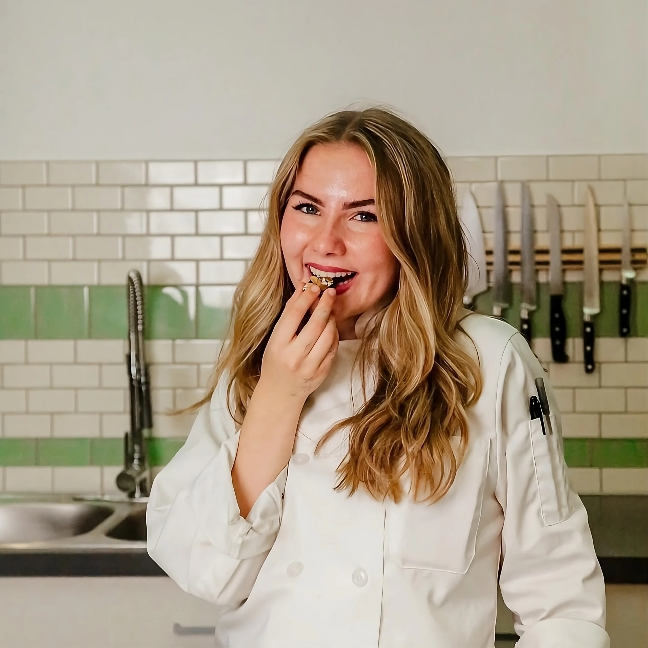Quality Test for No-Bake Recipes Nora tasting a No-Bake treat to ensure quality for vegan dessert recipe.